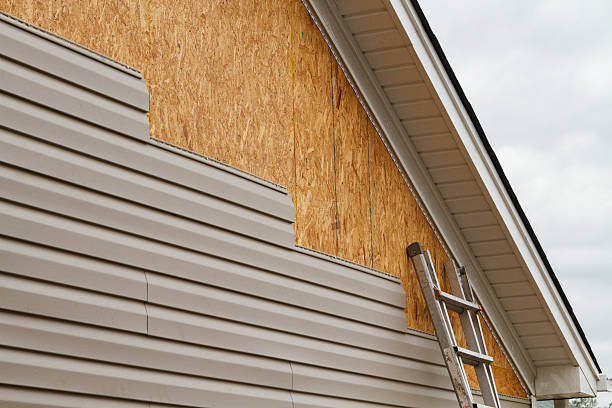 Professional Siding Installation technician working in Lexington, MA